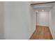 Spacious walk-in closet with hardwood floors and a wooden rod at 7204 N Decatur Blvd, North Las Vegas, NV 89131