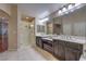 Bathroom boasts double sinks, a walk-in shower, and a spacious vanity area at 7311 Velvet Sky St, Las Vegas, NV 89131