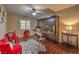 Multi-functional room features a Murphy bed, desk, and two chairs at 7311 Velvet Sky St, Las Vegas, NV 89131