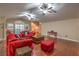 This expansive living room offers a cozy seating arrangement and stylish decor with wood flooring at 7311 Velvet Sky St, Las Vegas, NV 89131
