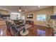 Spacious living room with hardwood floors, recessed lighting, and plantation shutters at 7311 Velvet Sky St, Las Vegas, NV 89131