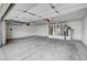 Garage showing concrete floor with white painted walls and ceiling at 8301 Shad Bush Ave, Las Vegas, NV 89149