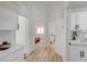 Hallway provides views of the bedroom and features access to the kitchen sink at 8301 Shad Bush Ave, Las Vegas, NV 89149