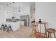 Bright kitchen features modern appliances, a central island with seating, and stylish pendant lighting at 8301 Shad Bush Ave, Las Vegas, NV 89149
