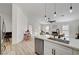 Kitchen island connects to the open-concept living area, enhancing flow to a dining nook at 8301 Shad Bush Ave, Las Vegas, NV 89149