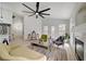 Open floor plan features a modern kitchen and comfortable living area at 8301 Shad Bush Ave, Las Vegas, NV 89149