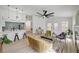 Open living space featuring modern kitchen, fireplace, and ample seating at 8301 Shad Bush Ave, Las Vegas, NV 89149
