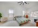 Spacious main bedroom with a vaulted ceiling, neutral colors, and generous natural light from multiple windows at 8301 Shad Bush Ave, Las Vegas, NV 89149