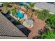 Captivating aerial view of the backyard featuring pool, mature landscaping and cabana at 8370 Unicorn St, Las Vegas, NV 89131