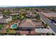 From above, this cozy home offers a refreshing pool, plenty of mature trees, and a large backyard at 8370 Unicorn St, Las Vegas, NV 89131