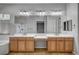 Bright bathroom with a double sink vanity, framed mirrors and wooden cabinets, offering plenty of counter space at 8370 Unicorn St, Las Vegas, NV 89131