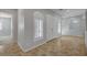 Inviting entryway with tiled floor, shuttered windows, and a double-door entry at 8370 Unicorn St, Las Vegas, NV 89131