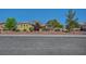 Attractive desert-landscaped home featuring mature trees and a well-maintained lawn in a lovely neighborhood at 8370 Unicorn St, Las Vegas, NV 89131
