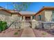 Inviting front entrance with a well-maintained walkway and decorative gate at 8370 Unicorn St, Las Vegas, NV 89131