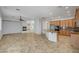 Spacious kitchen with granite counters and stainless appliances is open to the living room at 8370 Unicorn St, Las Vegas, NV 89131