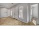 Inviting living room featuring tile flooring, natural light and a neutral color palette at 8370 Unicorn St, Las Vegas, NV 89131