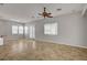 Expansive living space features tile floors, neutral paint, recessed lighting, and a ceiling fan at 8370 Unicorn St, Las Vegas, NV 89131