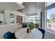 Open-concept living room with a view to the golf course, seamless flow into the kitchen at 9425 Villa Ridge Dr, Las Vegas, NV 89134