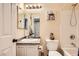 Cozy bathroom featuring a shower-tub combination with white fixtures and neutral walls at 9557 Cabot Falls Ave, Las Vegas, NV 89149