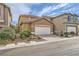 Charming two-story home featuring a spacious driveway, two-car garage, and well-maintained landscaping at 9557 Cabot Falls Ave, Las Vegas, NV 89149