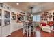 Cozy dining area featuring hardwood floors, an inviting dining set, and stylish decor at 9692 Waukegan Ave, Las Vegas, NV 89148