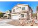 Charming two-story home with a well-maintained yard and attached two car garage at 9692 Waukegan Ave, Las Vegas, NV 89148