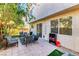Private patio area with brick pavers and ample seating, perfect for outdoor entertaining at 9692 Waukegan Ave, Las Vegas, NV 89148