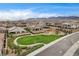 Overhead view of community park and playground, nestled among houses, with mountain views at 9993 Birch Knoll Ave, Las Vegas, NV 89166