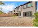 Spacious backyard with low-maintenance gravel and a small patch of green at 9993 Birch Knoll Ave, Las Vegas, NV 89166