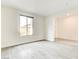 Bright living room with wood floors and large window at 9993 Birch Knoll Ave, Las Vegas, NV 89166