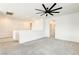 Upstairs loft area with neutral carpet and bright walls at 9993 Birch Knoll Ave, Las Vegas, NV 89166