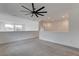 Bright loft space with neutral carpet, recessed lighting and modern ceiling fan at 9993 Birch Knoll Ave, Las Vegas, NV 89166