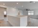 Open loft area with neutral carpet, recessed lighting and a stylish ceiling fan at 9993 Birch Knoll Ave, Las Vegas, NV 89166