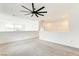 Open upstairs loft space with carpet and bright natural light at 9993 Birch Knoll Ave, Las Vegas, NV 89166