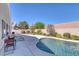 Spacious backyard with a pool, patio area, and low maintenance landscaping, perfect for entertaining at , Las Vegas, NV 89130