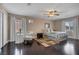 Second spacious bedroom with wood floors, neutral walls and ceiling fan at , Las Vegas, NV 89130