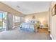 Spacious bedroom with carpet, neutral walls, and a sliding glass door to outdoor view at , Las Vegas, NV 89130