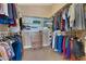 Walk-in closet with built-in shelving and hanging racks for clothing storage at , Las Vegas, NV 89130