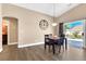 Bright dining area features modern flooring, neutral walls, and backyard access at , Las Vegas, NV 89130