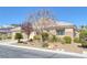 Inviting single-story residence featuring desert landscaping, mature trees and neutral color palette at , Las Vegas, NV 89130