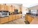 Kitchen features wood cabinetry, stainless steel appliances, and views to the dining area at , Las Vegas, NV 89130