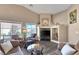 Bright living room features a built-in media center and a seating area by large windows at , Las Vegas, NV 89130
