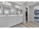 Bright bathroom with double vanity, shower, and walk-in closet, ideal for a contemporary lifestyle at 10367 Andele Ave, Las Vegas, NV 89166