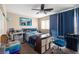 Bedroom featuring a ceiling fan, carpeted floors, and a window at 10766 La Florentina Ave, Las Vegas, NV 89166