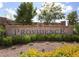 Providence community sign surrounded by lush green landscaping and yellow flowers at 10766 La Florentina Ave, Las Vegas, NV 89166