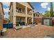 Home's exterior shows a private yard, balcony, and hardscape, great for entertaining at 10766 La Florentina Ave, Las Vegas, NV 89166