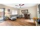 Cozy living room with wood floors, gray sofa, and decorative details at 10766 La Florentina Ave, Las Vegas, NV 89166