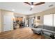 Inviting living space with a kitchen view and sliding glass doors to the patio at 10766 La Florentina Ave, Las Vegas, NV 89166