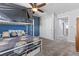 Bedroom with a bunk bed, gray carpet, and white closet doors at 1112 Adobe Creek Ct, North Las Vegas, NV 89084
