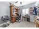 A functional home office with built-in shelves, a desk, and natural light at 1112 Adobe Creek Ct, North Las Vegas, NV 89084